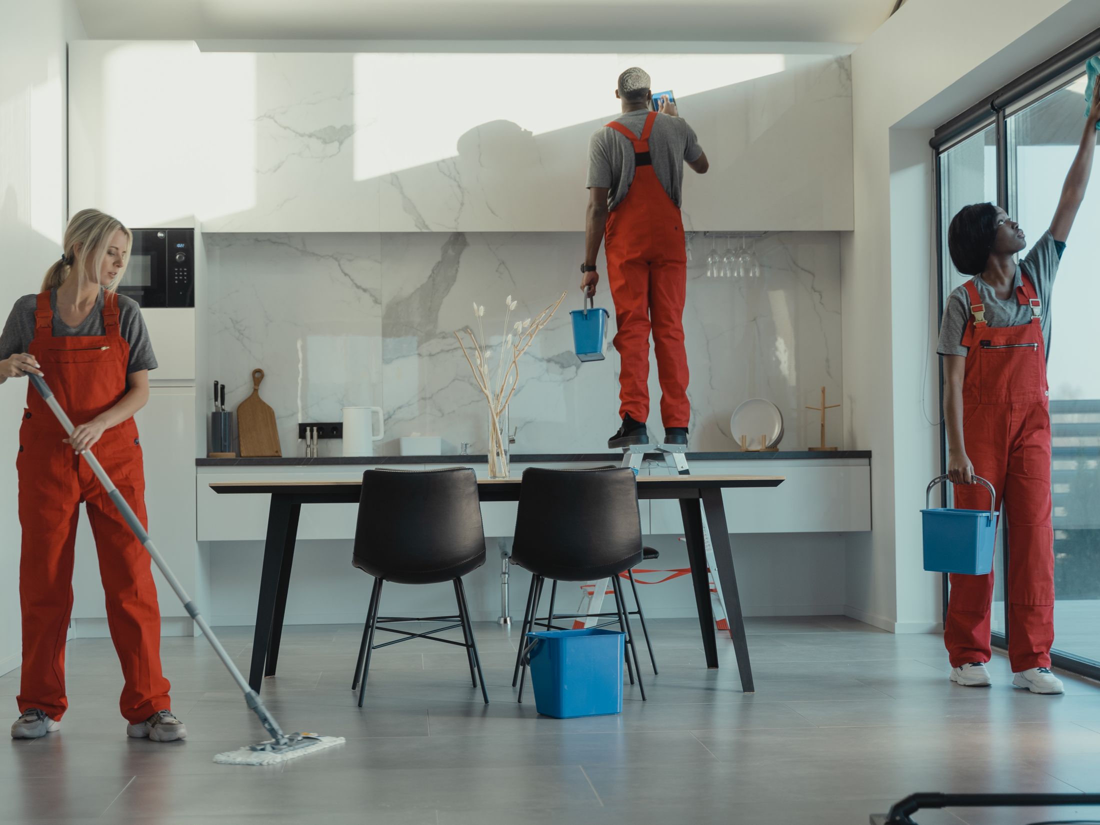 Cleaning crew servicing a modern open office space